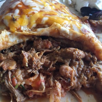 Rosie's Place - Inside the carnitas burrito (meat, beans, rice...) served wet. It was good. - Mexican Near Me - Wellington, Nevada Rosie's Place - Inside the carnitas burrito (meat, beans, rice...) served wet. It was good. - Mexican Near Me - Wellington, Nevada