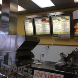 QuickPix Deli & Subs - Counter and menu