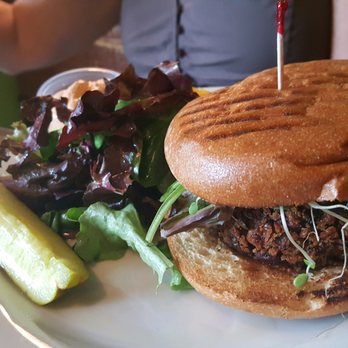 Kayak Kafe - The black-eyed pea burger with salad side. - Sandwiches Near Me - Savannah, Georgia Kayak Kafe - The black-eyed pea burger with salad side. - Sandwiches Near Me - Savannah, Georgia