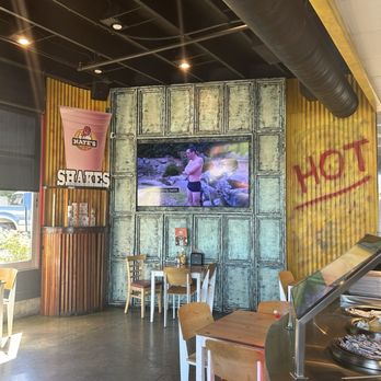Nate's Nashville Hot Chicken - large tv playing americas funniest home videos - Chicken Shop Near Me - Paso Robles, California