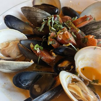 Gaby's Cafe - From the specials menu, mussels and clams with a wine sauce, sausages & bread for dipping. YUM - Mexican Near Me - Ellenville, New York