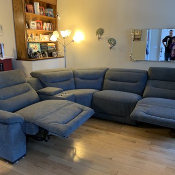 Sofa Land - Power reclining sectional sofa with power console and corner section. - Furniture Stores Near Me - Calgary, Alberta Sofa Land - Power reclining sectional sofa with power console and corner section. - Furniture Stores Near Me - Calgary, Alberta
