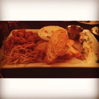 Pappadeaux Seafood Kitchen - Appetizer: I believe it's the sampler...crawfish Étouffée, salmon, and alligator. - Seafood Near Me - Austin, Texas