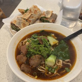 Pan Dumpling House - N1. Spicy Beef Noodle Soup H4. Beef Roll Pancake - Chinese Near Me - Corona, California Pan Dumpling House - N1. Spicy Beef Noodle Soup H4. Beef Roll Pancake - Chinese Near Me - Corona, California