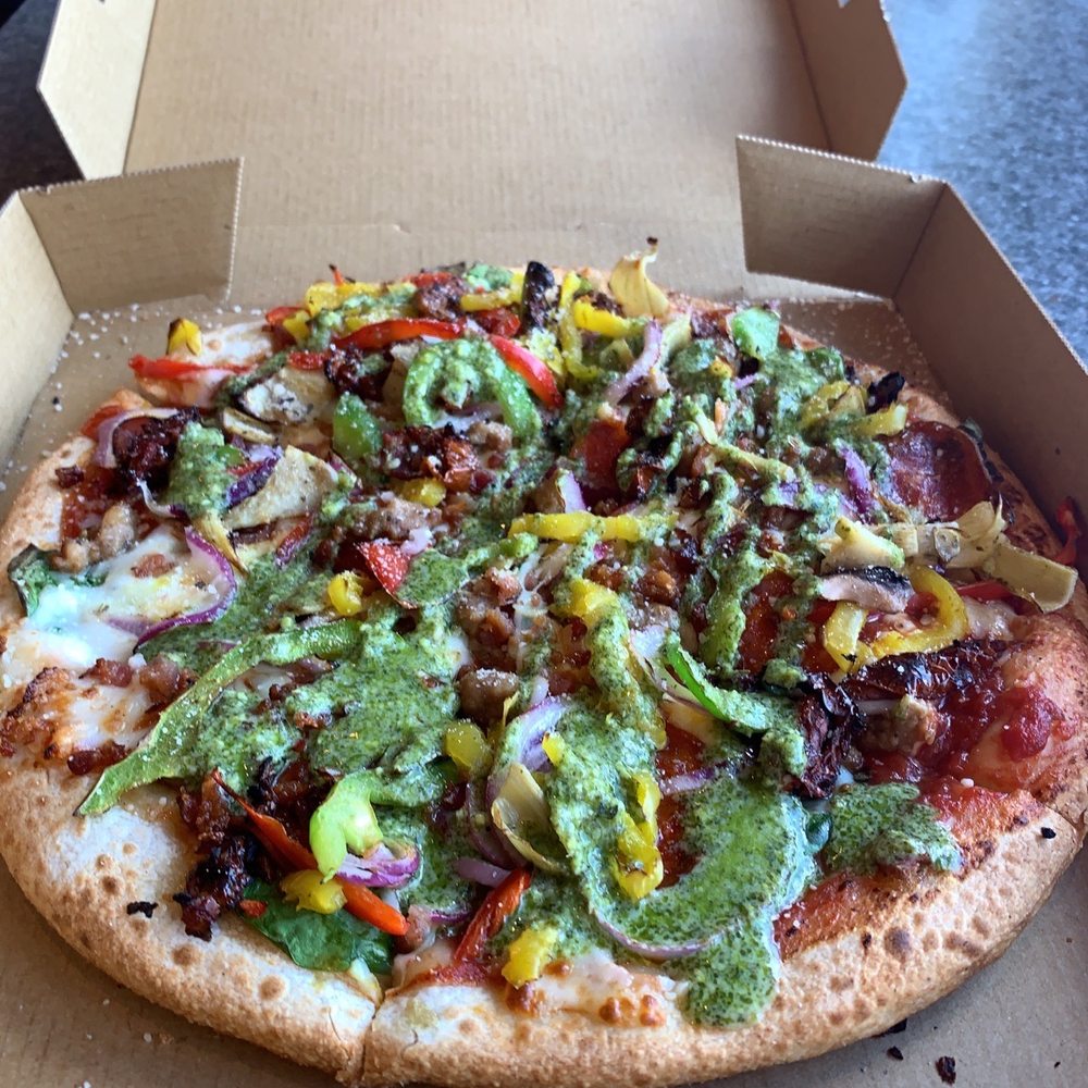 Pie Five Pizza - Regular and spicy sause mixed, all the fixins, and topped off with pesto drizzle. - Pizza Near Me - Fort Worth, Texas Pie Five Pizza - Regular and spicy sause mixed, all the fixins, and topped off with pesto drizzle. - Pizza Near Me - Fort Worth, Texas