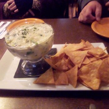 Hashes & Brews - Artichoke dip with crispy tortilla chips - Bars Near Me - San Bruno, California Hashes & Brews - Artichoke dip with crispy tortilla chips - Bars Near Me - San Bruno, California
