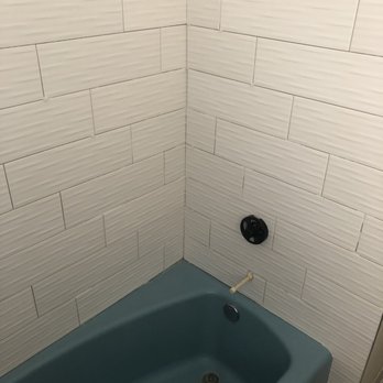 Perfect Refinishing - BEFORE - 60 year old blue tub - Refinishing Services Near Me - Jacksonville, Florida