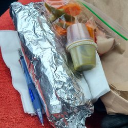 Taqueria Rolly’s - Good size Burrito comes with salsa and pickled jalapeños in the bag