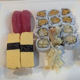 2 pieces of Tuna, 2 pieces of Tomago, Sweet potato roll and a Shrimp tempura roll. What a great dinner all made with love by Benz. 2 pieces of Tuna, 2 pieces of Tomago, Sweet potato roll and a Shrimp tempura roll. What a great dinner all made with love by Benz.