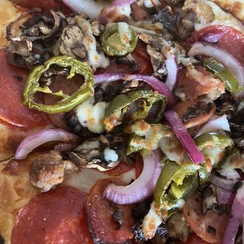 Stratton's Pizzeria - The Grippa, up close and personal. - Pizza Near Me - Galt, California Stratton's Pizzeria - The Grippa, up close and personal. - Pizza Near Me - Galt, California