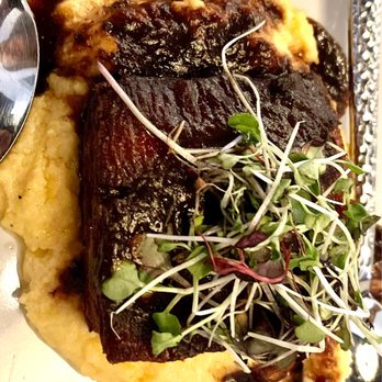 Bourbon Boulevard - Braised Pork Belly Served over grits and sweet tamarind sauce - Steakhouses Near Me - Chantilly, Virginia Bourbon Boulevard - Braised Pork Belly Served over grits and sweet tamarind sauce - Steakhouses Near Me - Chantilly, Virginia