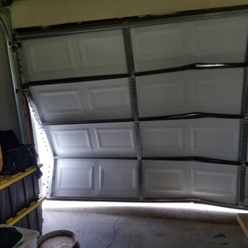Door Pro America - My husband opened the side door when it was windy and this happened. They said it's not under warranty. Only had it 14 months - Garage Door Services Near Me - Gainesville, Virginia Door Pro America - My husband opened the side door when it was windy and this happened. They said it's not under warranty. Only had it 14 months - Garage Door Services Near Me - Gainesville, Virginia