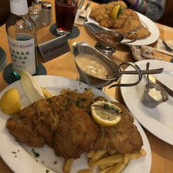 Bei Oma Kleinmann - Top to bottom: Viennese pork schnitzel and regular veal schnitzel