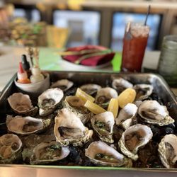 Wednesday $1 fresh oysters, Soul to Squeeze cocktail (delicious).