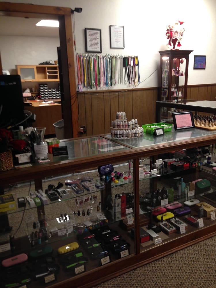 J GRAY’S VAPOR SHOPPE & TANNING SALON Updated September 2024 204 E