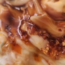 With the toppings (soy sauce, hoisin sauce, peanut sauce and chili oil) soo good