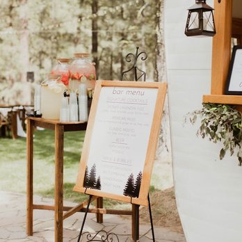 Petite Street - a sign for a wedding reception in front of a camper - Food Trucks Near Me
