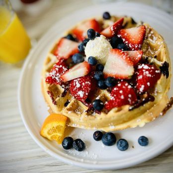 Biscuits And Gravy - a waffle topped with strawberries and blueberries - Salad Near Me - Clawson, Michigan Biscuits And Gravy - a waffle topped with strawberries and blueberries - Salad Near Me - Clawson, Michigan