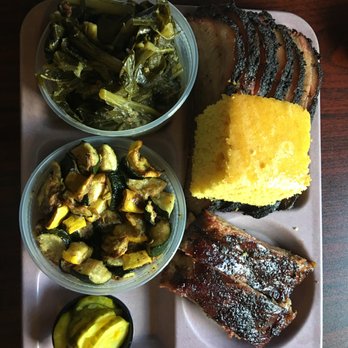 The Slow Bone - brisket, ribs, greens, squash side, cornbread - really tasty! - Barbeque Near Me - Dallas, Texas The Slow Bone - brisket, ribs, greens, squash side, cornbread - really tasty! - Barbeque Near Me - Dallas, Texas
