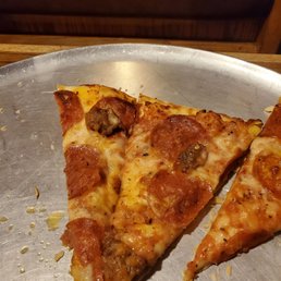 Pepperoni pizza with sausage Pepperoni pizza with sausage