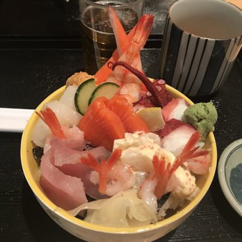 Oka Sushi - a bowl of food on a tray - Sushi Bars Near Me - Jasper, Alberta Oka Sushi - a bowl of food on a tray - Sushi Bars Near Me - Jasper, Alberta