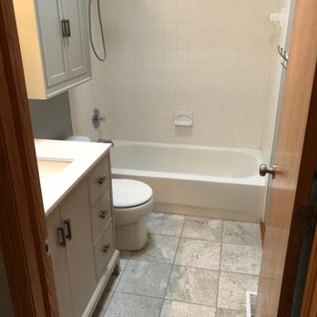 Simon Serves - The bathroom ... can't tell if those tiles are separate, can you? - Handyman Near Me Simon Serves - The bathroom ... can't tell if those tiles are separate, can you? - Handyman Near Me