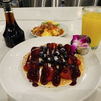 SweetDiner - Berry blast pancakes, Scrambled Eggs with onions and topped with Avocado and Salsa, Fresh squeezed OJ - Diners Near Me - Milwaukee, Wisconsin