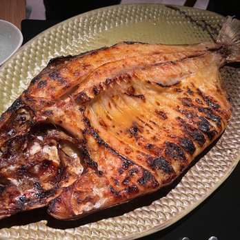 Banzeiro - Tambaqui Band on Brasa Grilled half Tambaqui fish - Seafood Near Me - Itaim Bibi, SP