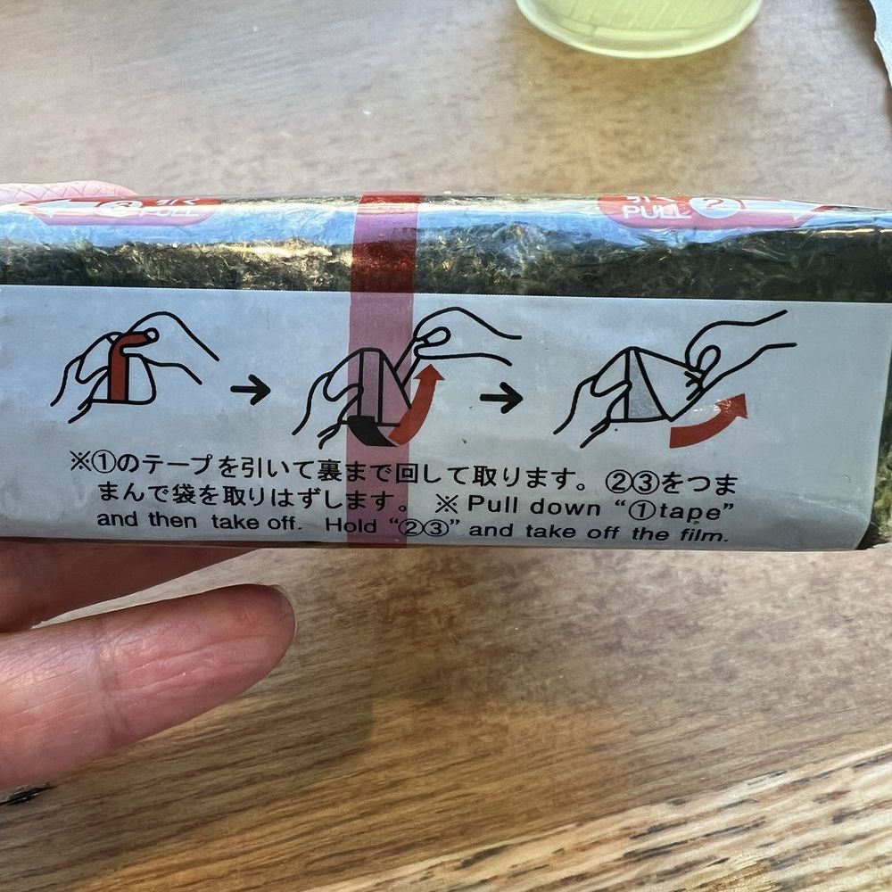 Do-Re-Mi - ORIGAMI instructions on how to open the onigiri packaging - Asian Fusion Near Me - San Francisco, California Do-Re-Mi - ORIGAMI instructions on how to open the onigiri packaging - Asian Fusion Near Me - San Francisco, California