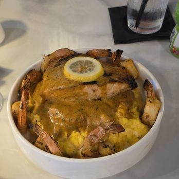 Toast - Salmon shrimp and grits in Cajun sauce - Wine Bars Near Me - Greensboro, North Carolina Toast - Salmon shrimp and grits in Cajun sauce - Wine Bars Near Me - Greensboro, North Carolina