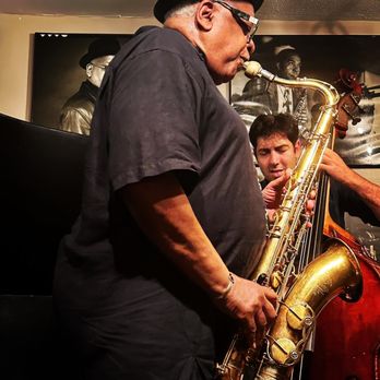 Bill's Place - a man playing a saxophone and a man playing a bass - Jazz & Blues Near Me - New York, New York Bill's Place - a man playing a saxophone and a man playing a bass - Jazz & Blues Near Me - New York, New York