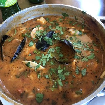 Primavera Cafe Restaurant - Monkfish Rice (includes clams, mussels and shrimp too!) - Portuguese Near Me - Ludlow, Massachusetts Primavera Cafe Restaurant - Monkfish Rice (includes clams, mussels and shrimp too!) - Portuguese Near Me - Ludlow, Massachusetts