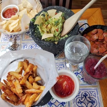 Tio Pepe - Fries, guacamole, chorizo, chips with salsa. Enough for two!!! - Spanish Near Me - New York, New York Tio Pepe - Fries, guacamole, chorizo, chips with salsa. Enough for two!!! - Spanish Near Me - New York, New York