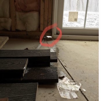 Denzal Custom Homes - Holes on side of basement walk out door - General Contractors Near Me - Eynon, Pennsylvania
