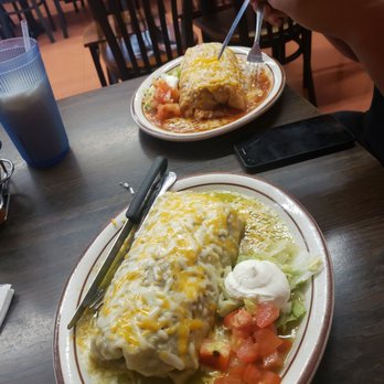 Mi Ranchito - Lengua wet burrito with green salsa. And a carne asada wet burrito with red sauce. - Mexican Near Me - Reno, Nevada Mi Ranchito - Lengua wet burrito with green salsa. And a carne asada wet burrito with red sauce. - Mexican Near Me - Reno, Nevada