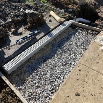 A Guy & His Tractor - Channel drain and concrete sidewalk installation - Excavation Services Near Me