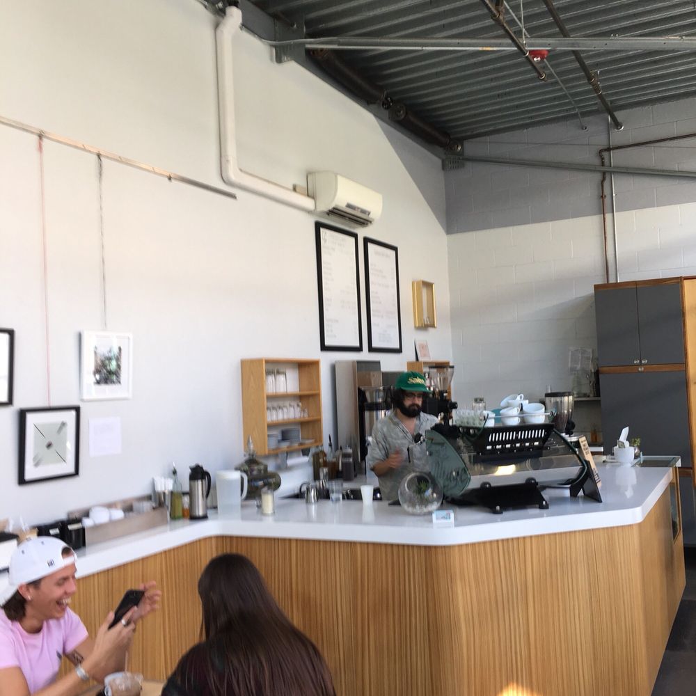two people sitting at a table two people sitting at a table