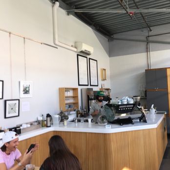 Press Cafe - two people sitting at a table - Cafes Near Me - Ithaca, New York