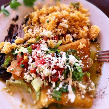 Dos Carlitos - Chicken enchiladas verde! Committed a bit of a Yelp Foul by taking a couple bites before I realized I Hadent taken a photo yet!! - Mexican Near Me - Santa Ynez, California Dos Carlitos - Chicken enchiladas verde! Committed a bit of a Yelp Foul by taking a couple bites before I realized I Hadent taken a photo yet!! - Mexican Near Me - Santa Ynez, California