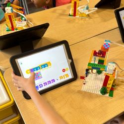 STEM Center USA - Beginner coding - making the model he built move with the iPad