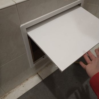 New Concept Painting & Remodeling - Access panel neatly installed in existing tile work - Painters Near Me New Concept Painting & Remodeling - Access panel neatly installed in existing tile work - Painters Near Me