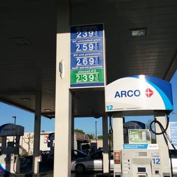 ampm - a gas station with a gas station sign - Convenience Stores Near Me - Merced, California