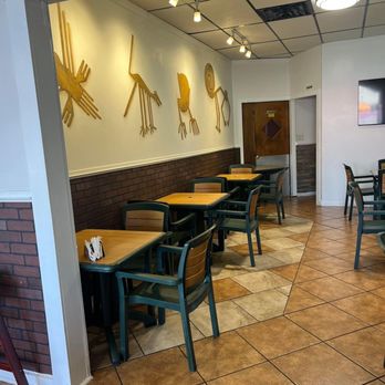 Mi Bandera Peruvian Restaurant - tables and chairs - Peruvian Near Me - Schenectady, New York Mi Bandera Peruvian Restaurant - tables and chairs - Peruvian Near Me - Schenectady, New York