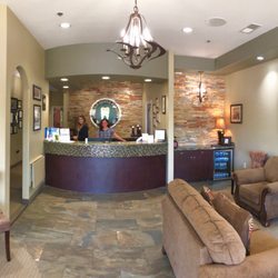 Oroville Gentle Dentistry - Panorama of our friendly front desk team members and our lobby.