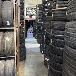 They have multiple rooms of tires stacked to the ceiling