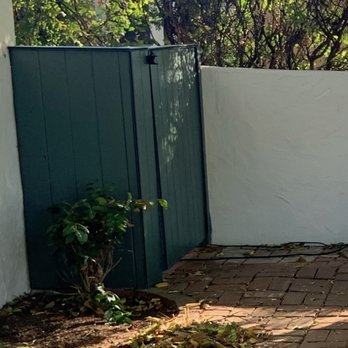 LA Team Vinyl Fences - Side view: painted gate - Fences & Gates Near Me