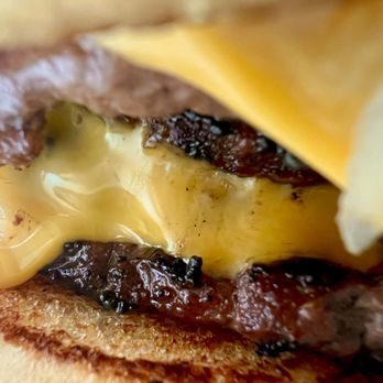 Frosty Drive N - Deliciously melting cheese to bind the patties together. - Burgers Near Me - Denton, Texas Frosty Drive N - Deliciously melting cheese to bind the patties together. - Burgers Near Me - Denton, Texas