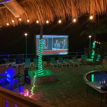 Sunset Grille & Raw Bar - All the entertainment you could hope for; a pool, a big screen, and live music. - Seafood Near Me - Marathon, Florida Sunset Grille & Raw Bar - All the entertainment you could hope for; a pool, a big screen, and live music. - Seafood Near Me - Marathon, Florida