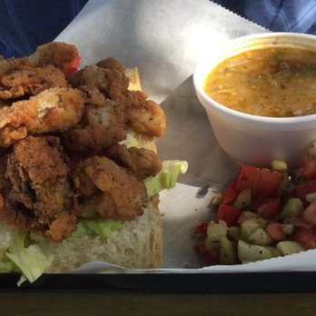 Bayou Bites - Oyster Po'boy with Tomato and Cucumber Salad with a cup of Chicken and Sausage Gumbo.  Delicious! - Cajun/Creole Near Me - Dunedin, Florida