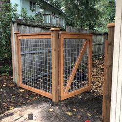 City Wide Fence - 10' span of cedar & hog wire fence